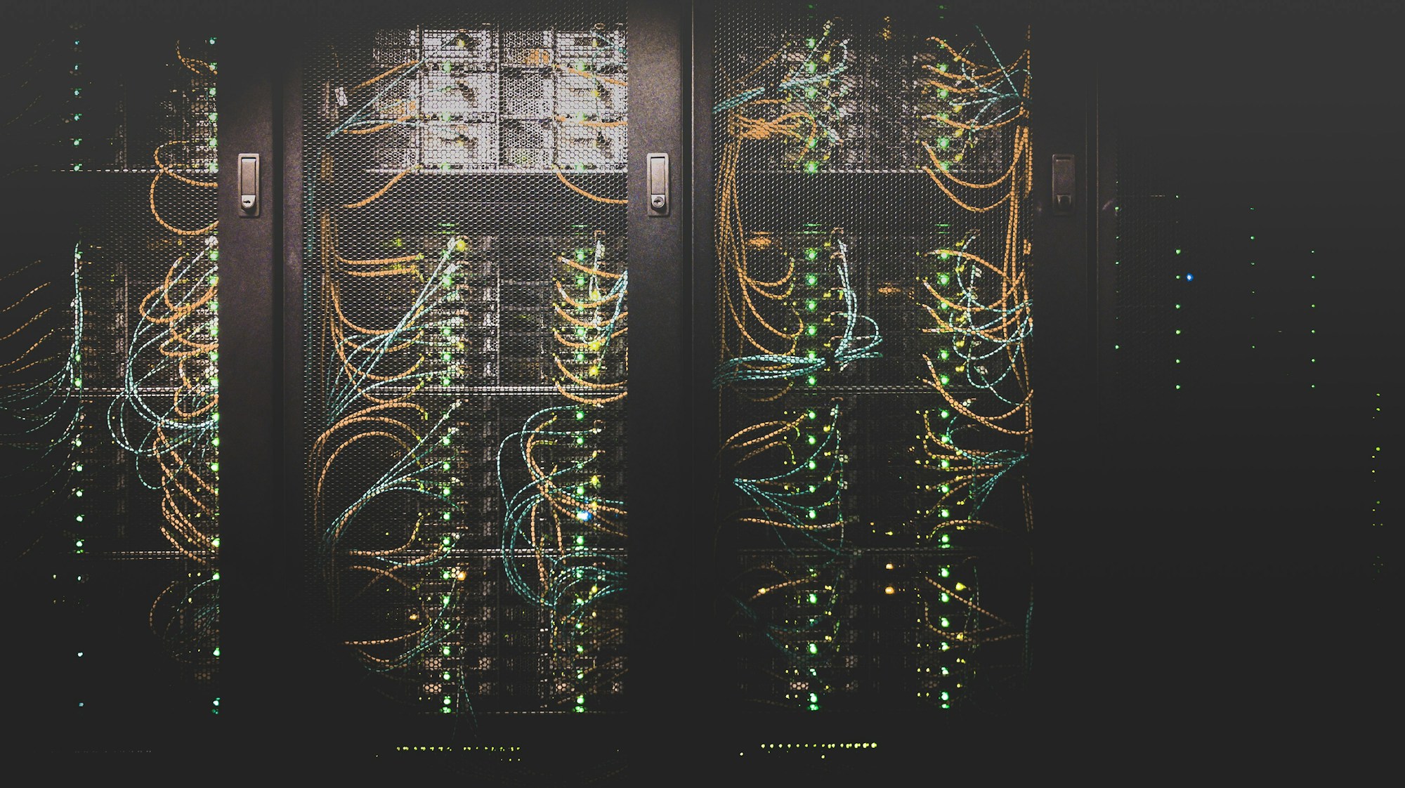 Enterprise data center with server racks and blue lighting for cloud infrastructure operations